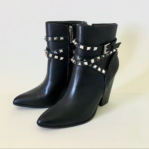 Black ankle boots with studded belts